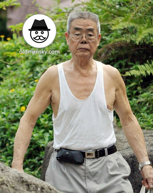 Thin glasses old man wore white vest undershirt and middle pants went ...