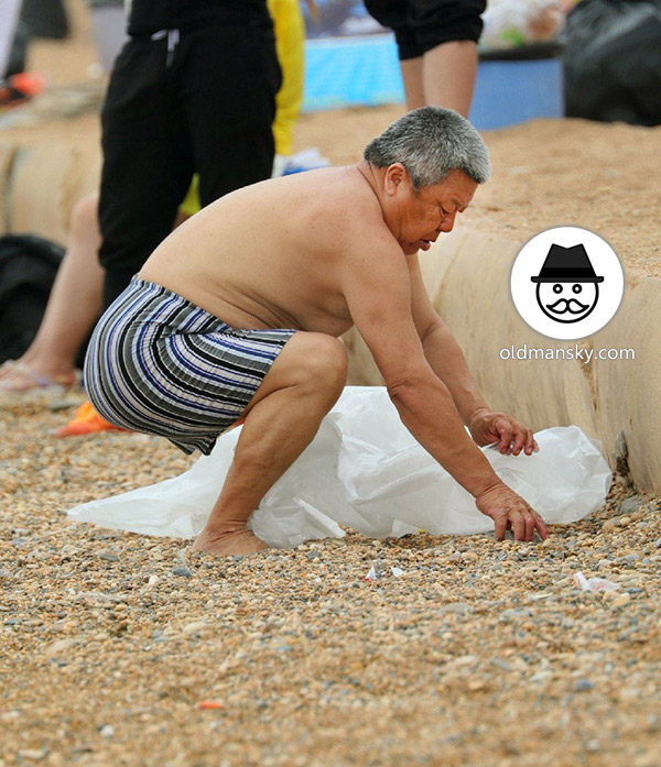 Silver hair chub swimming old man played on the beach