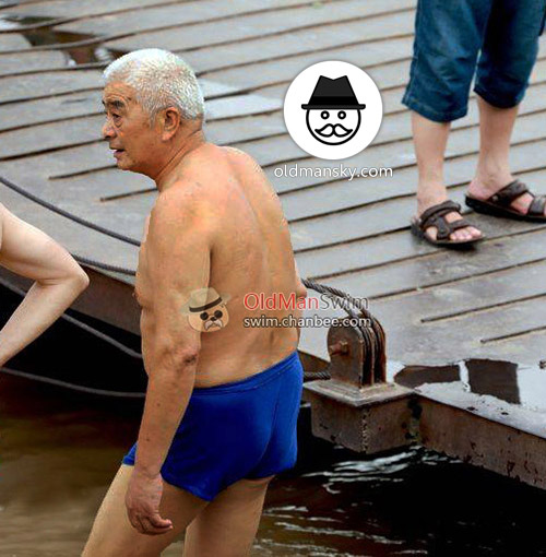 White hair old man in a brown underwear went swimming by the river_07